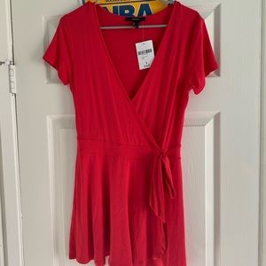 Red Romper with skirt over shorts